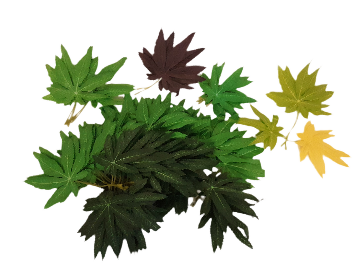 DecoBudz leaf set with 96 lifelike faux cannabis leaves in vibrant, realistic colors, perfect for decor and crafting projects