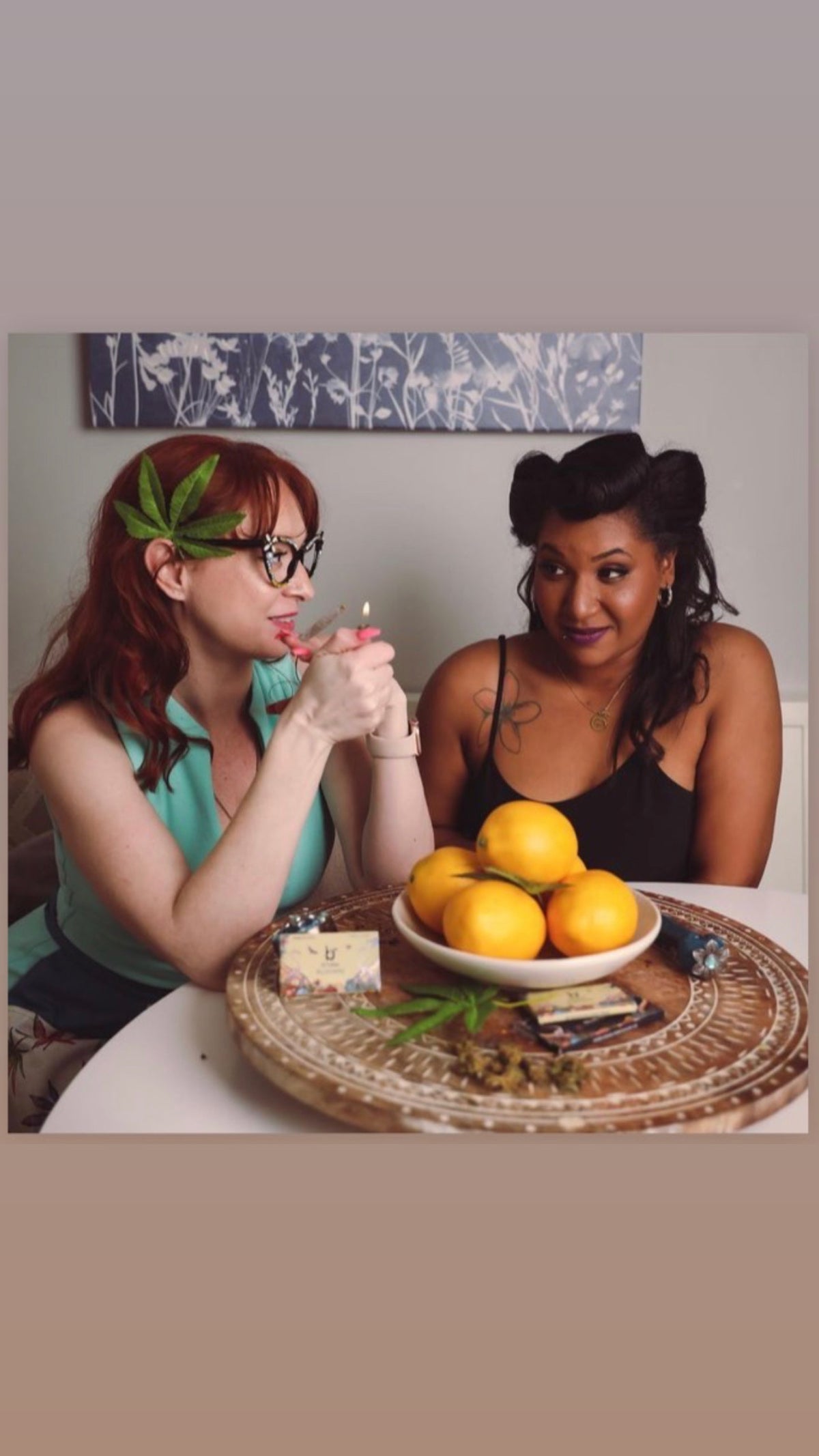 Boudoir photoshoot with artistic flair, showcasing a model and DecoBudz faux cannabis leaves for a bold, creative look